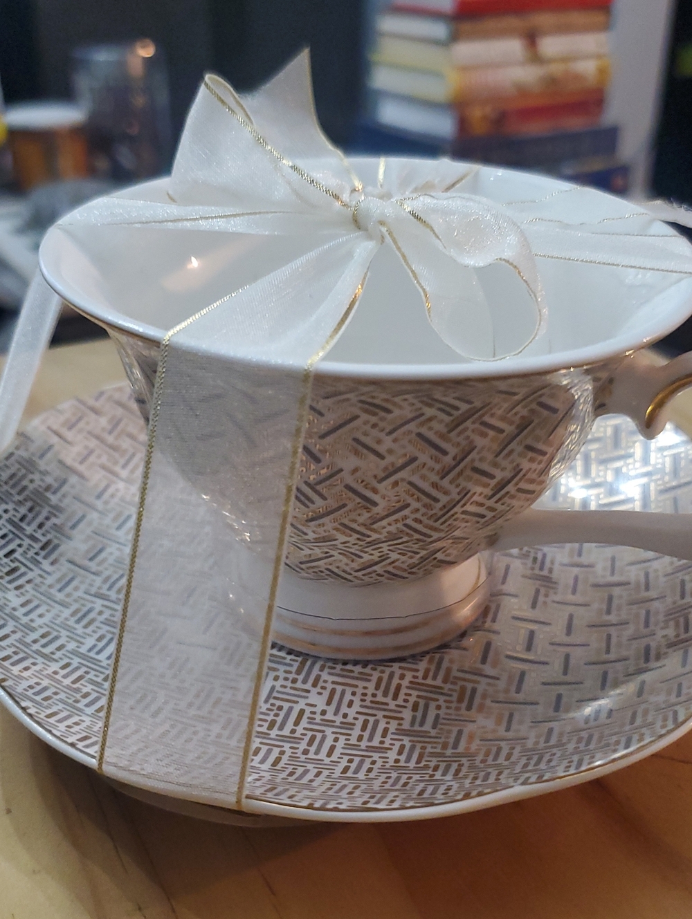 White and Gold Porcelain Teacup & Saucer - Decorative Pattern